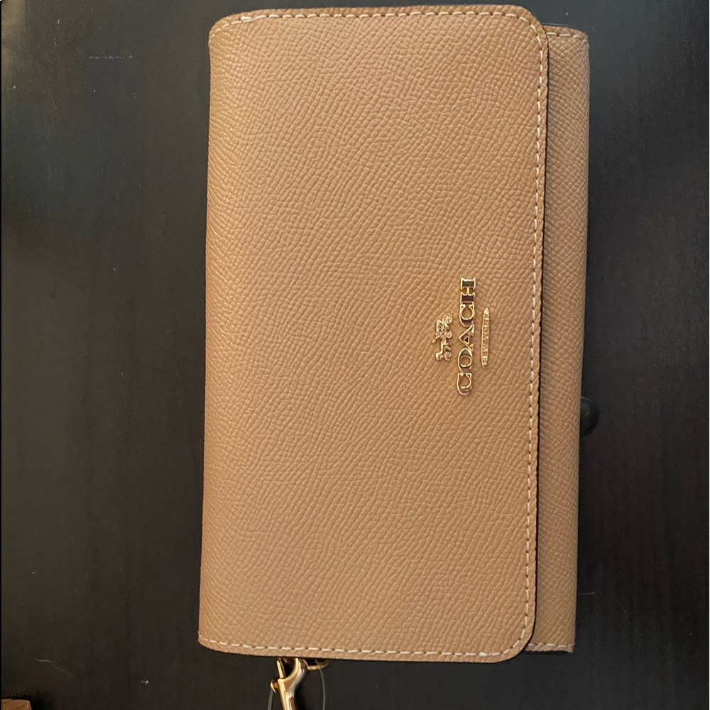 Brand new .. never used coach wristlet wallet